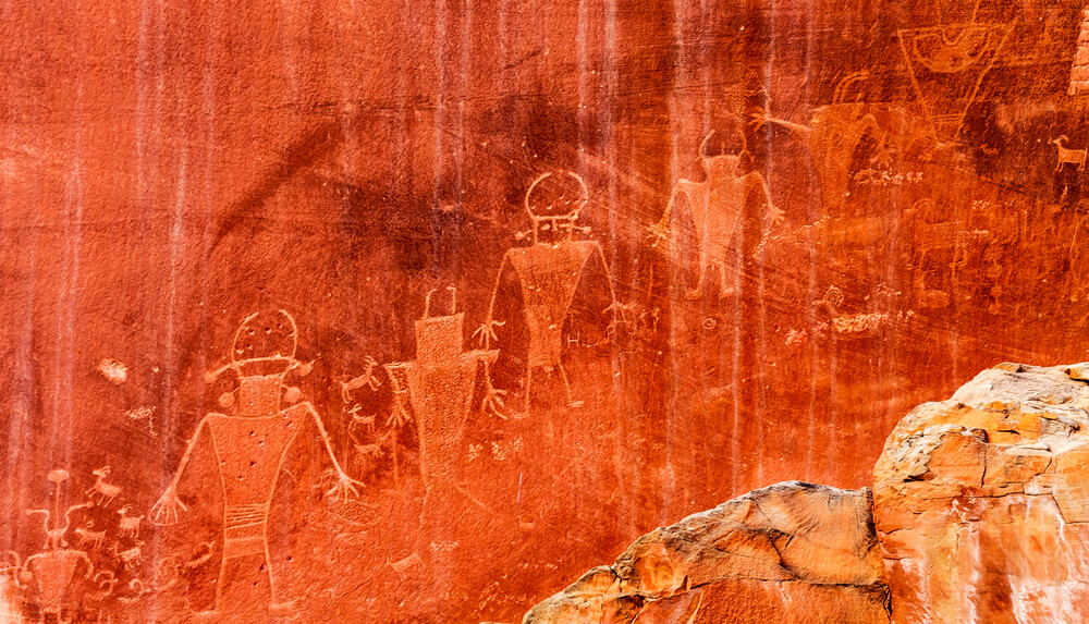 Capitol Reef includes a scenic drive that includes petroglyphs and beautiful hikes.